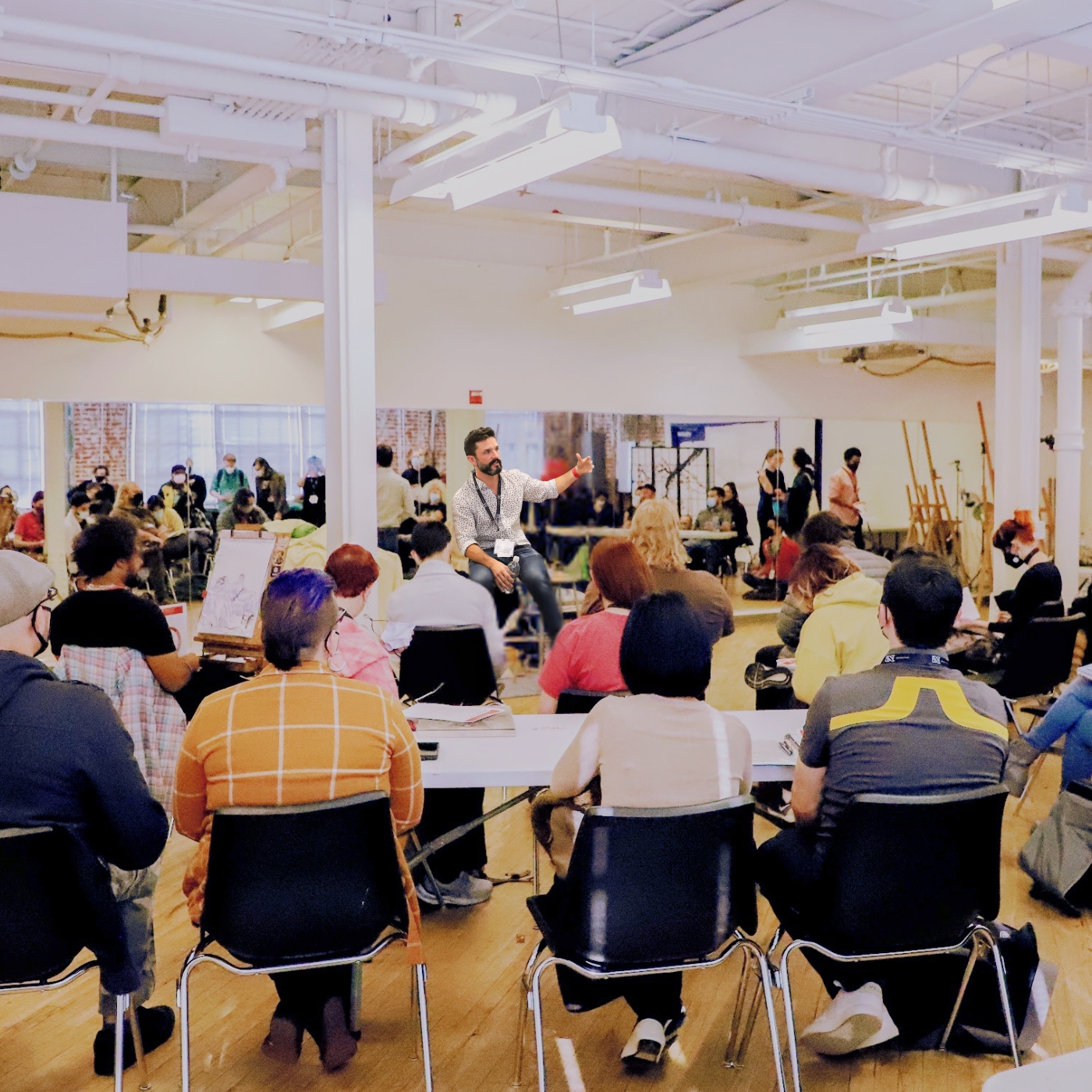 marc scheff speaking to a group of people