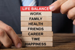 life balnce areas listed on wooden blocks