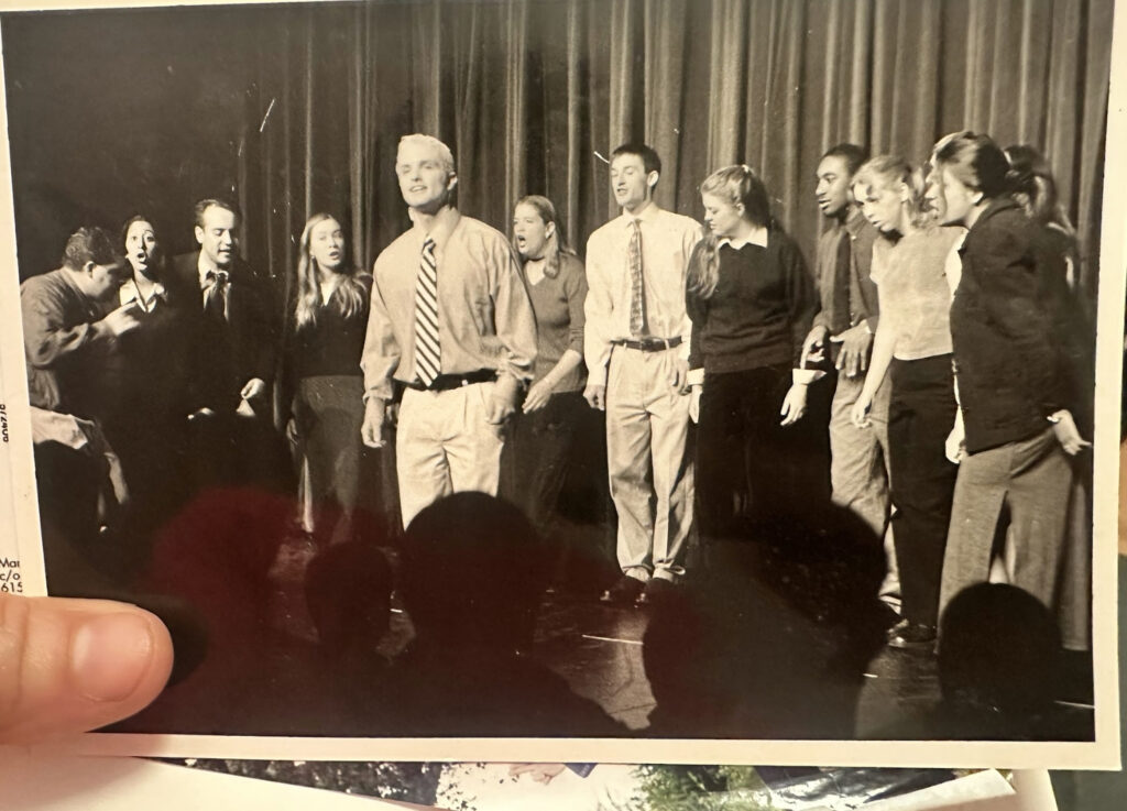 marc scheff singing a solo with his college a cappella group at Harvard